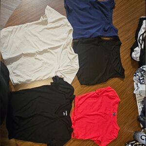 Assorted T-Shirts in Black, Cream, Blue, and Red